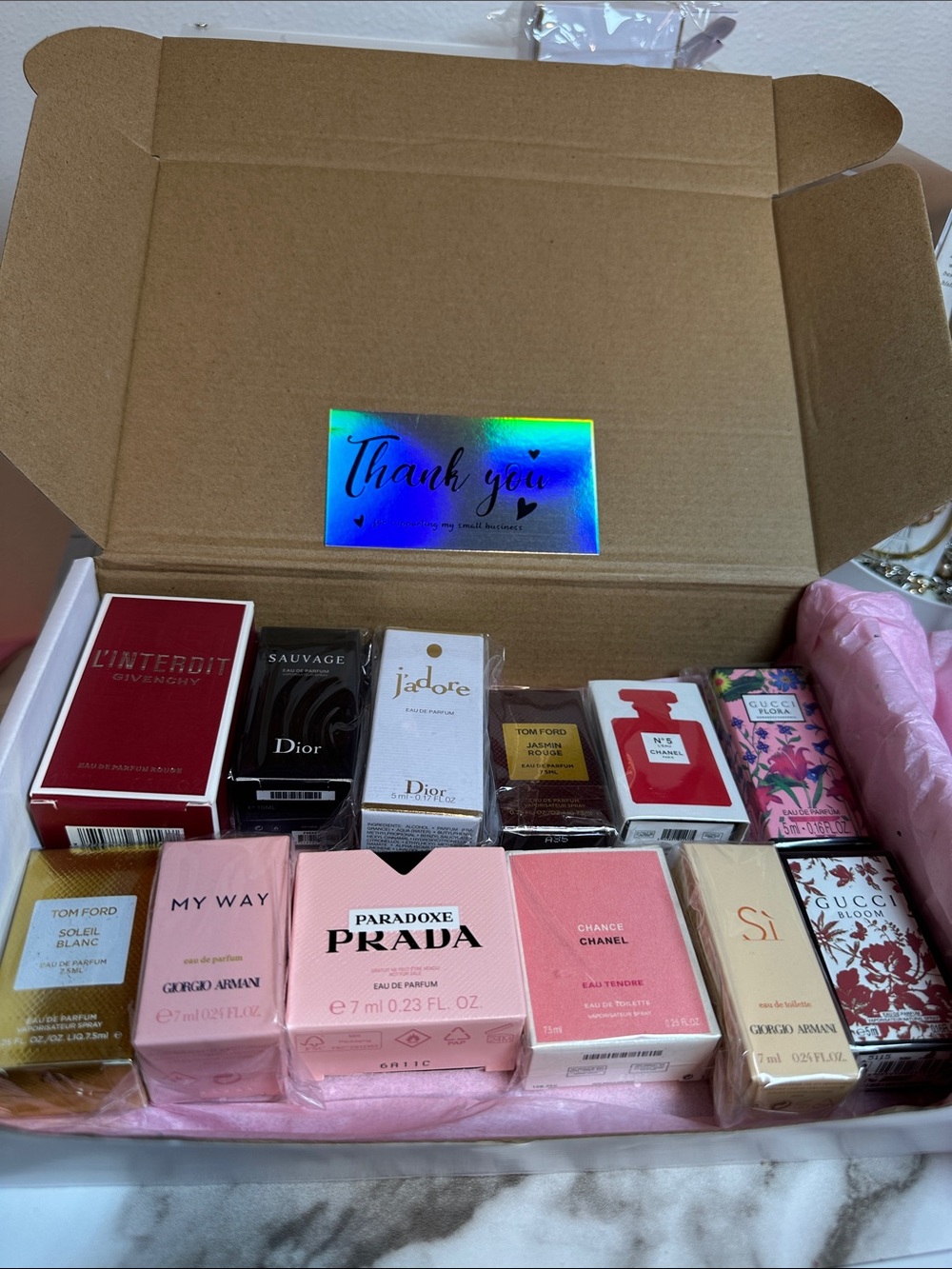 Random Luxury Women's Perfume Mini Set of 12 pieces. Brand New. Never used.